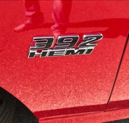 One 392 hemi badge emblem adhesive back 35 or 2 for 60.  See all pix sold separately SHIPPING AVAILABLE