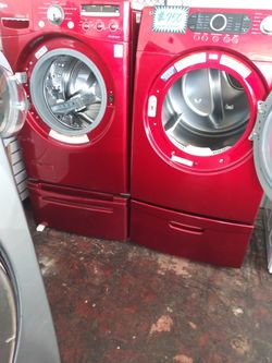 Front load washer LG and electric dryer Samsung set with pedestals in excellent conditions