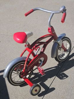 12" Boys bike, with trainer wheels and bell