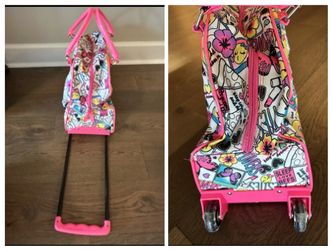 Like new Justice Overnight travel bag, bag on wheels with a handle