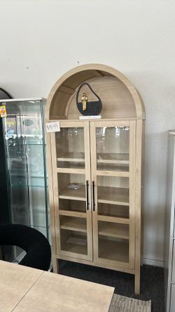 Natural wood arched cabinet