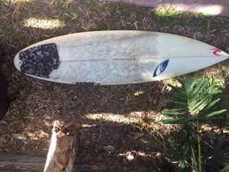 6'2". Sharp Eye SBX rounded pin shortboard