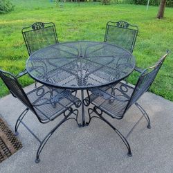 Black Wrought Iron Table and Four Chairs