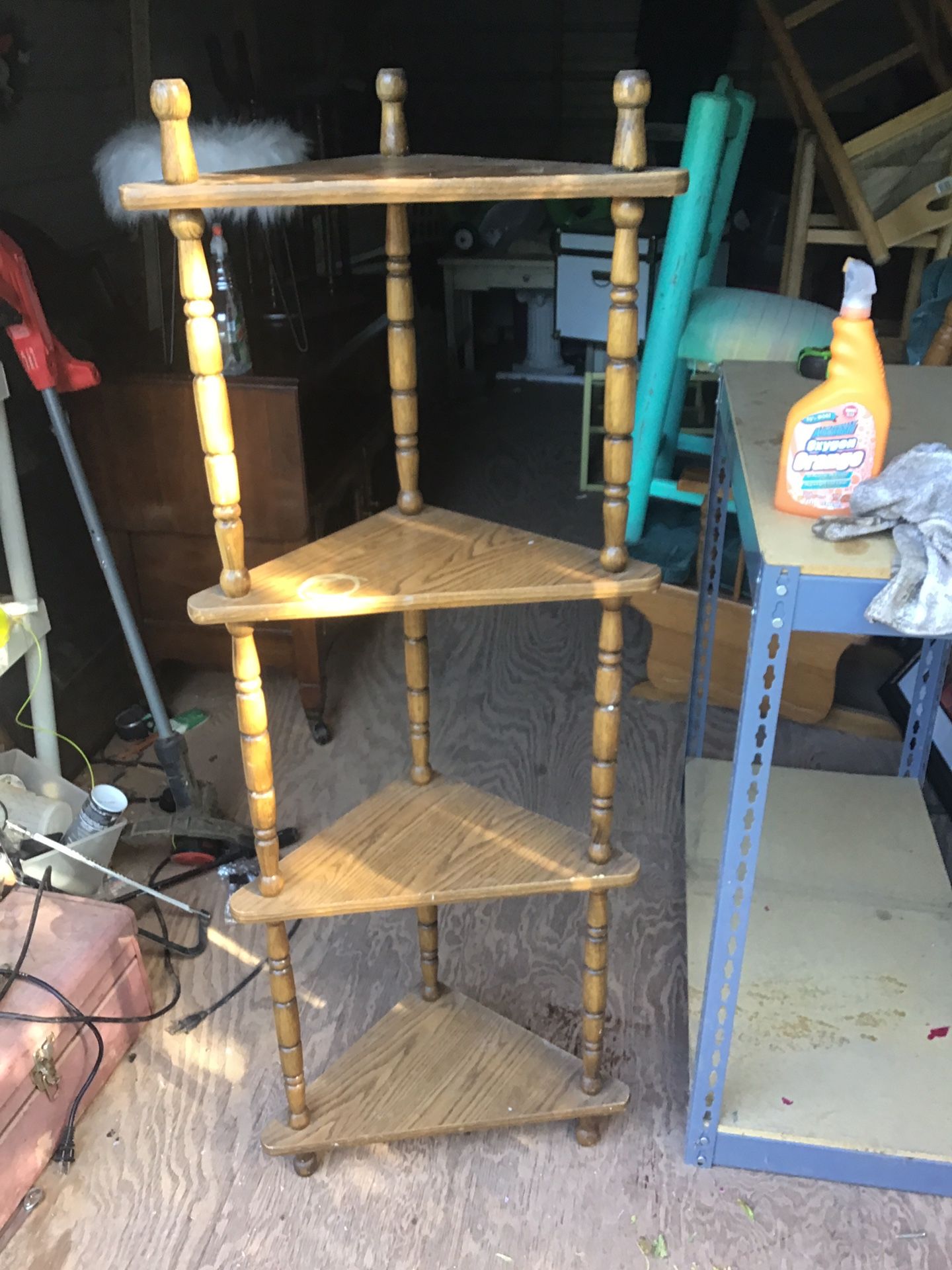 A corner shelf it’s 54 inches tall and 20 inches across the to