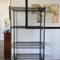 Metal Rack 4 Shelves  Color Black With Wheels