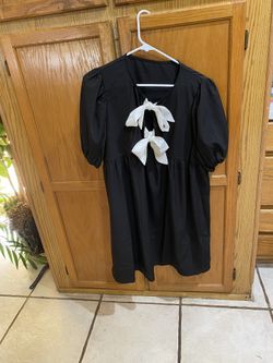 New! Black Dress With Bows. Read description for details and location.