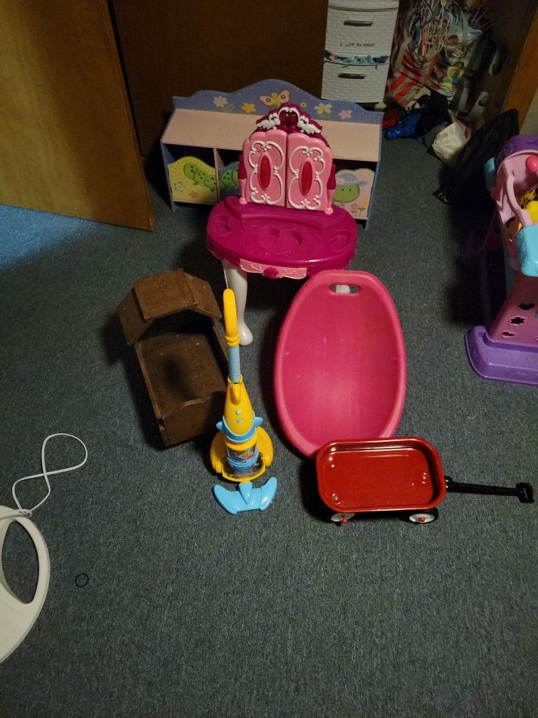Kids Toys. (Baby Shark Vacuum $5, Musical Vanity $10, Radio Flyer Wagon $10, Pink Chair $5, Baby Wooden Crib $5