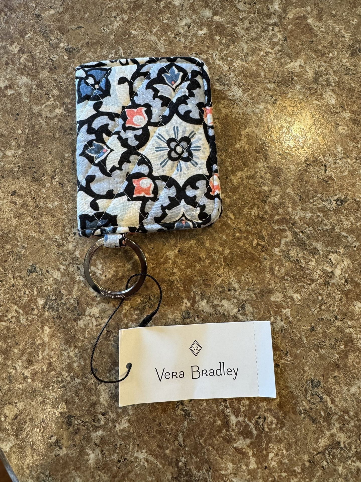 Woman’s brand new ID holder keychain shipping available