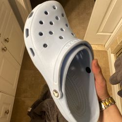Size 12 baby blue crocs. worn a few times but in great condition 