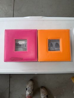 Photo Storage Boxes With Photo Display Top. Like new inside. Pink lid has a dark residue mark on top. Bottom have scratches on felt