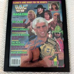 RARE WWF MAGAZINE  AUTOGRAPHED BY RIC FLAIR, WWE