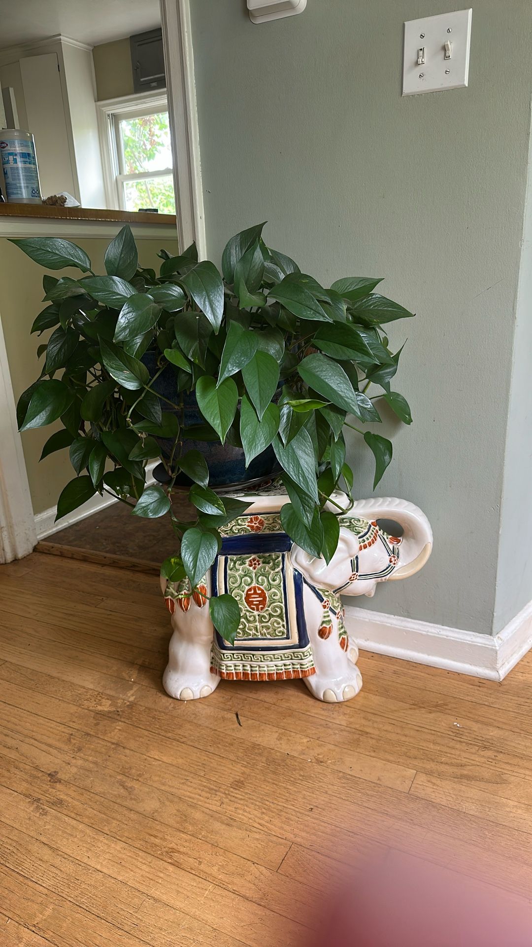 Elephant stand with plant