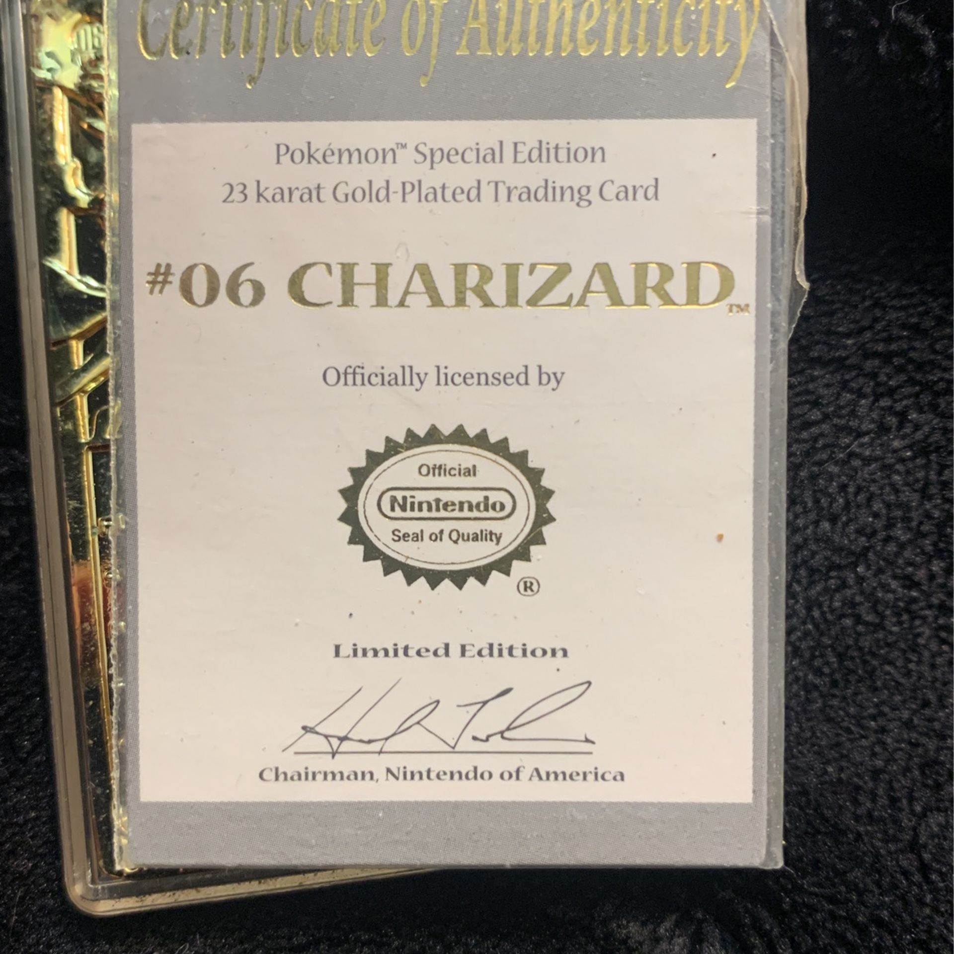 the new pokemon card game Charizard #6 23K Gold Plated Trading Card in Red Ball