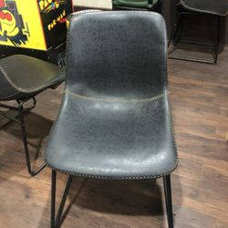 2 BLACK LEATHER CHAIRS $25..EACH 