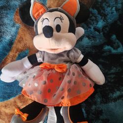 Disney Parks Halloween Minnie Mouse plush toy.