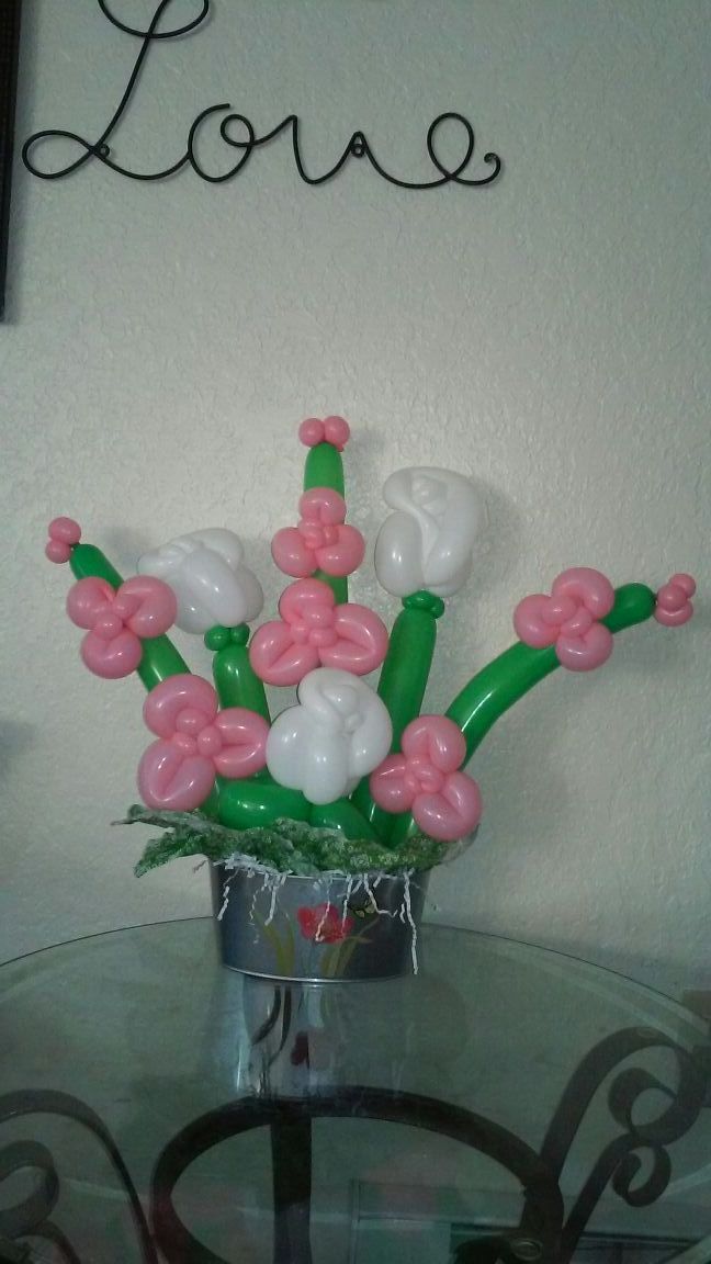 Orchid and roses balloon bouquet.