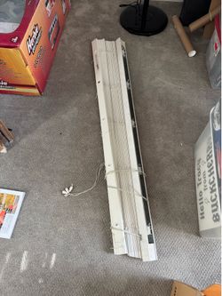 58” wide x 46” tall.   white window blind