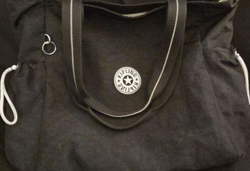 Use Kipling black tote purse bag