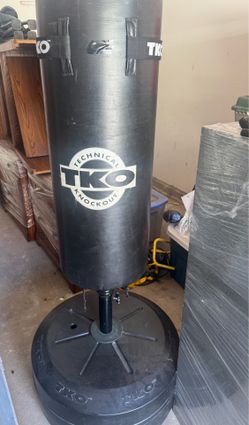 Punching bag. Fill stand with sand or water