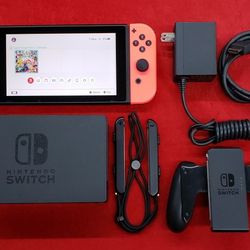 Nintendo Switch 32GB Video Game Sytem with Neon Blue/Red Joy-Con, Dock, AC Adapter, HDMI Cable, Wrist Straps, & Comfort Grip - V2 - Working