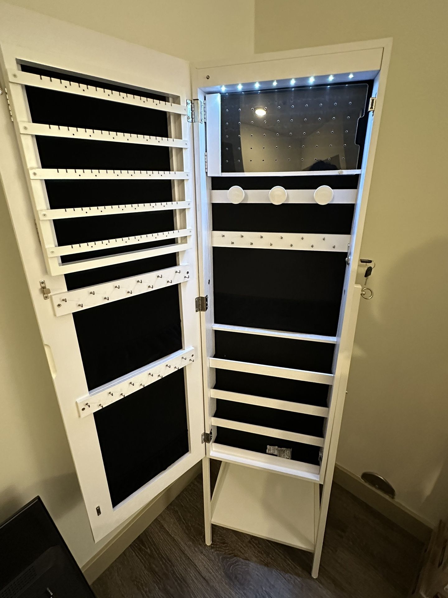 Jewelry display case with mirror.