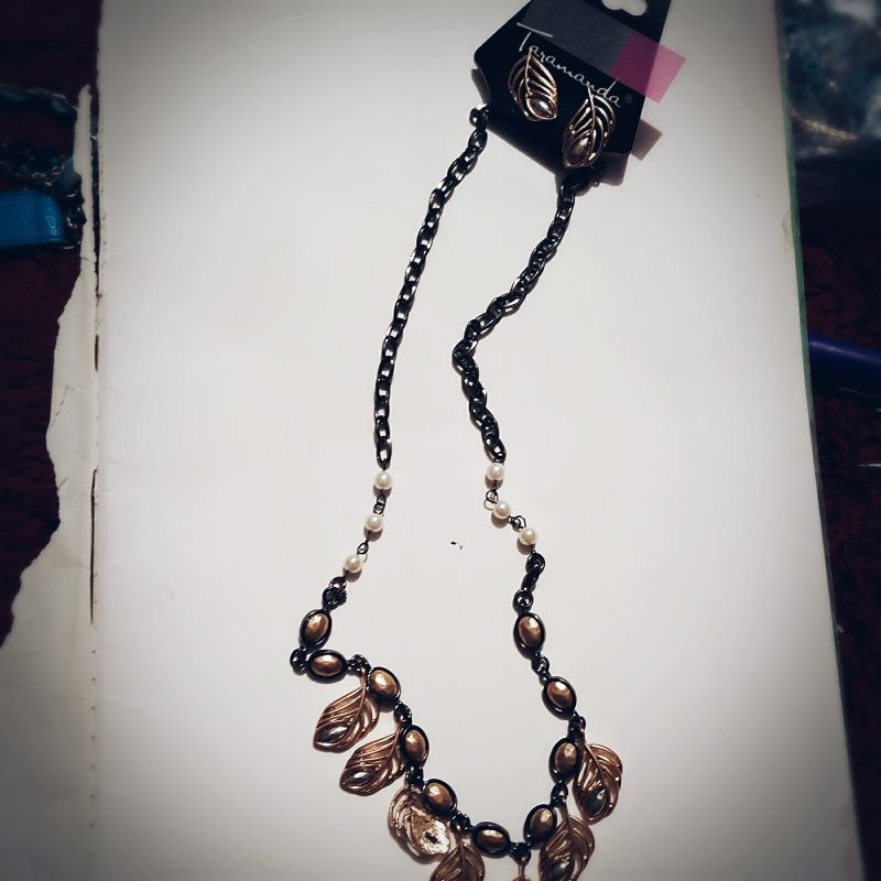 Black, gold leaf necklace with earrings
