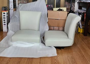 2 NEW Swivel Chairs (NO LEGS).