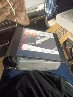 Binder of football cards