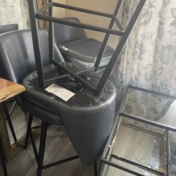 Set Of Three Swivel Counter Height Chairs