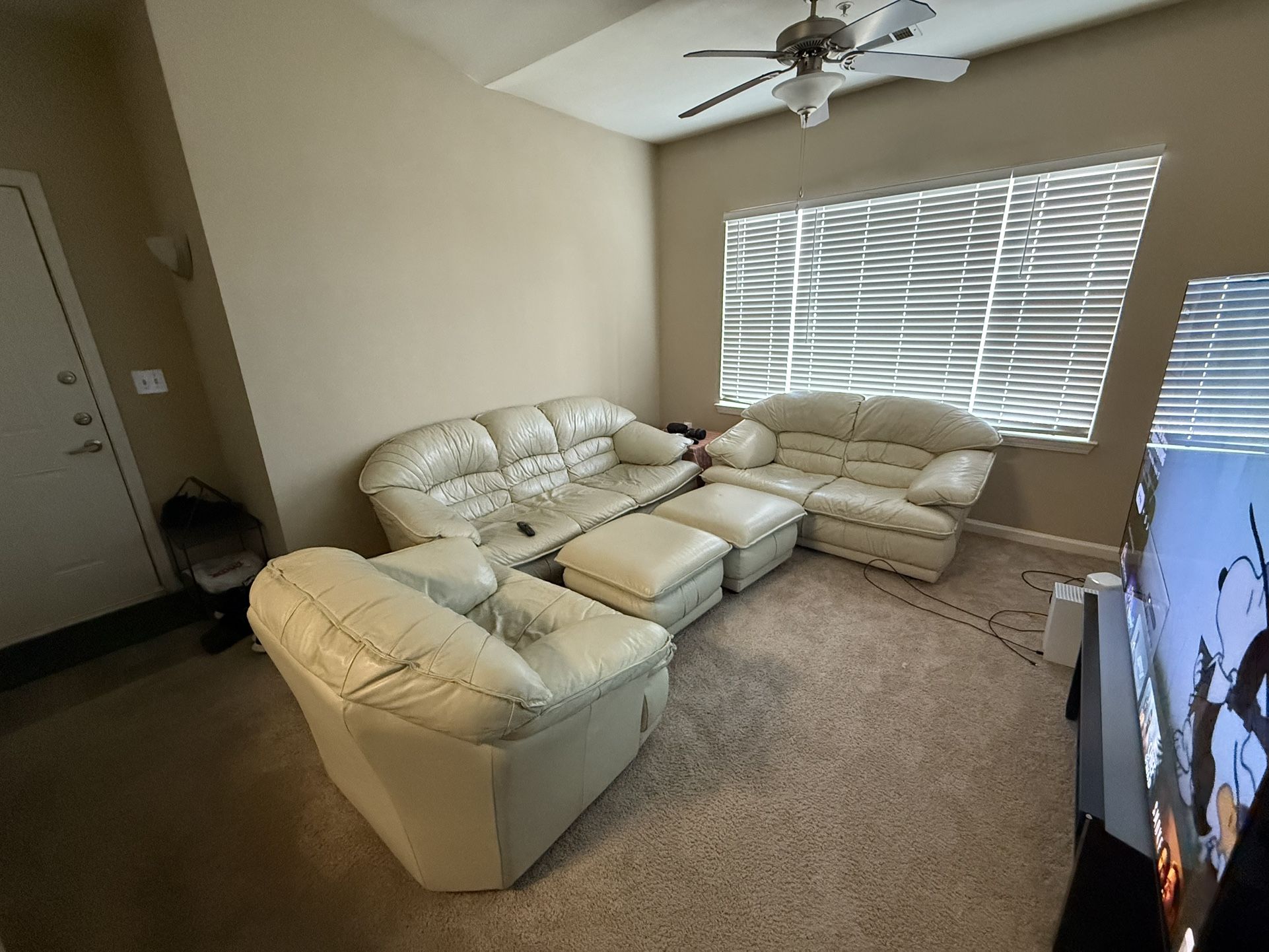 Cream Leather Living Room Set – Sofa, Loveseat, Armchair & 2 Ottomans