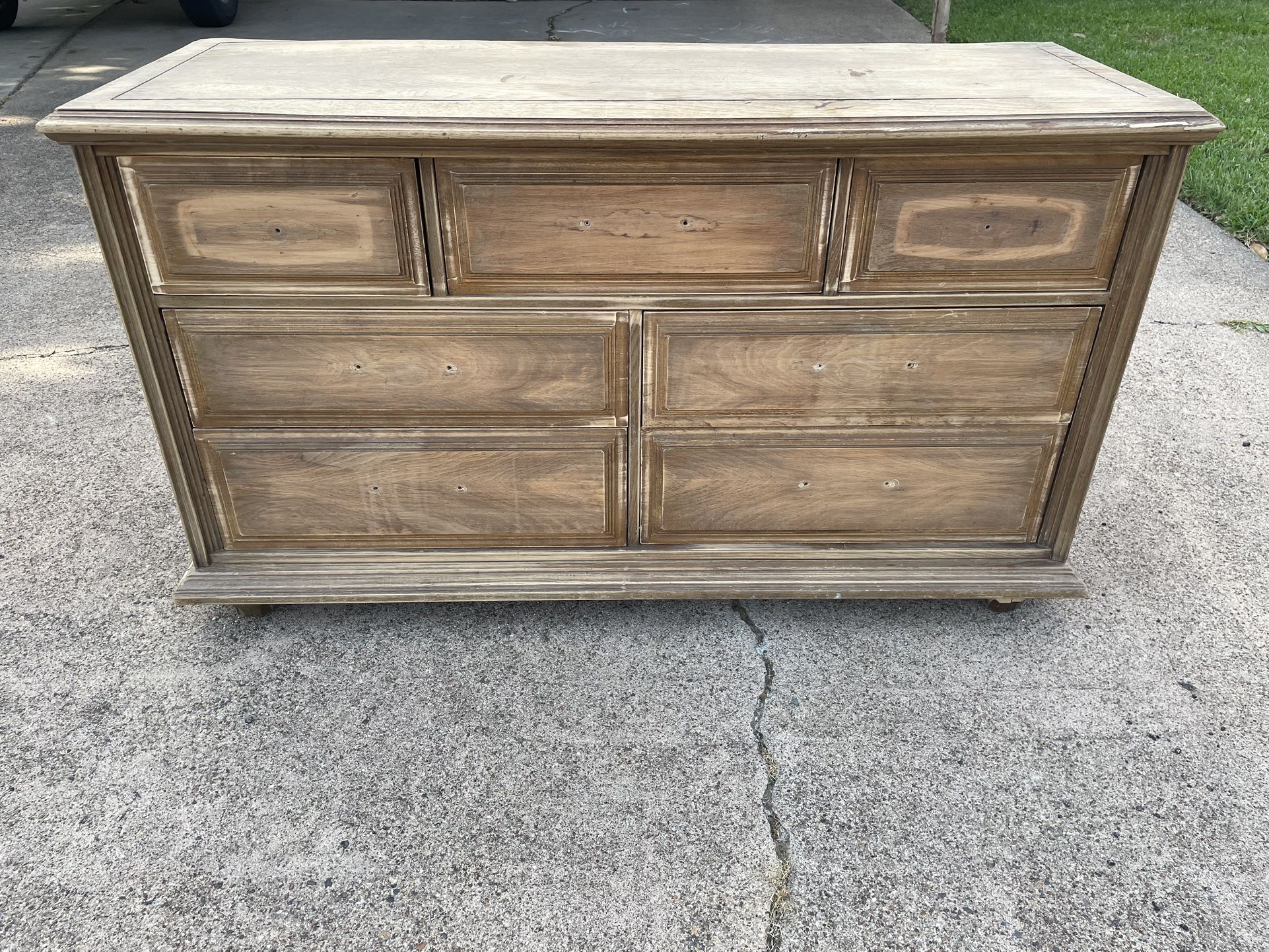 Vintage wood seven drawer dresser. Missing all drawer pulls