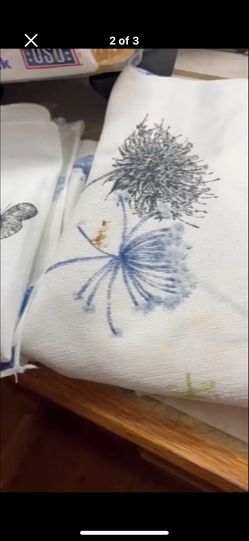 $10)and white butterfly tablecloth with placemats and napkins