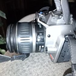 Canon Camera  Rebel Xt And Two Lenses Plus.