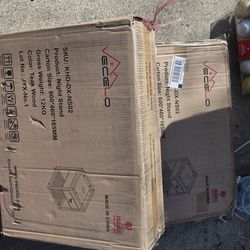 Two end tables In the box. Assembly required.