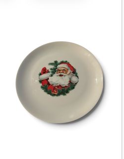 vintage Triomphe mid-century Santa Claus ceramic plate from around the 1950s or 1960s.