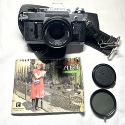 CANON AE-1 Program Vintage Japanese SLR 35mm Camera with 50mm Lens 1:1.8 Polarized filter Manual Used Working