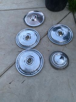 Early ford and mercury hubcaps