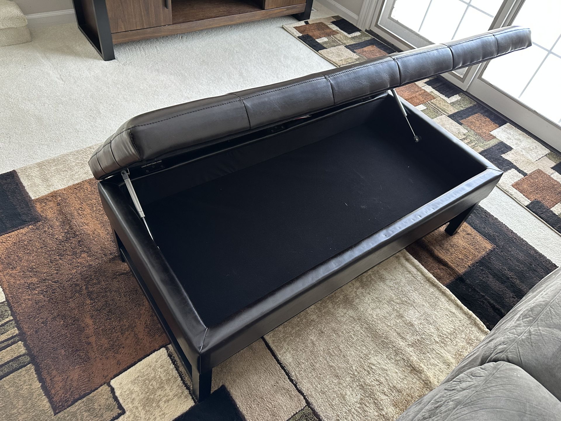 Brown wood and faux leather ottoman