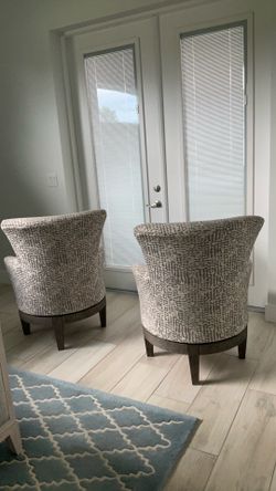 Pair of Justine Swivel Chairs with Flared Arms