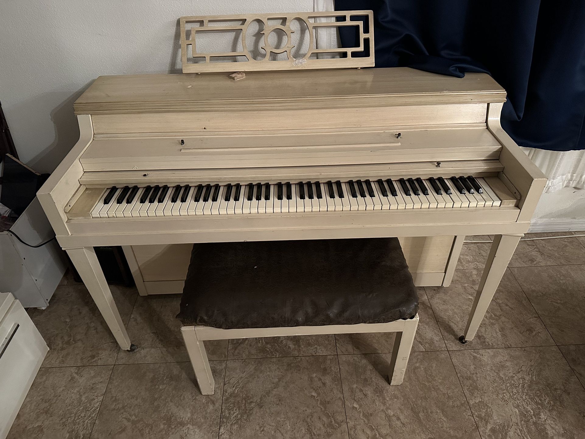 Piano for sale beige. around medium size fairly large