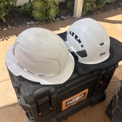 Hard Hats. New Petzl Hard Hat And Used Milwaukee Hard Hat