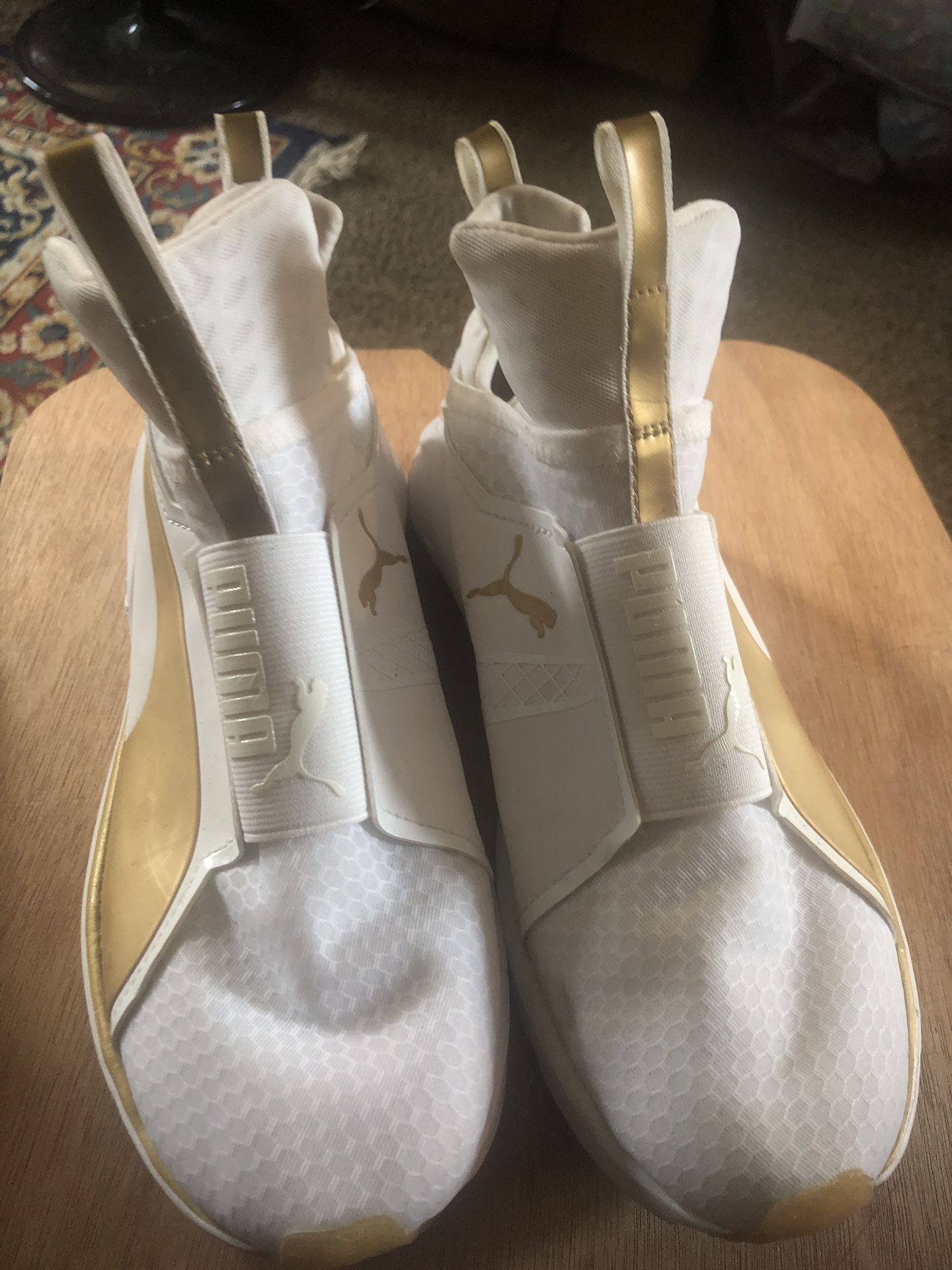 PUMA White And gold Slip Ins. Size 6.5Y