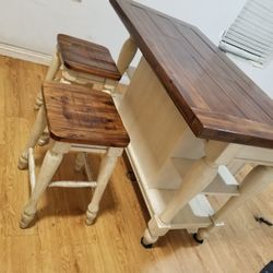 selling Island with 2 stools 55in. Wide,   30in.  depth, 35in. height