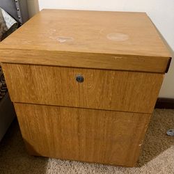 A pair of wooden side tables/night stands