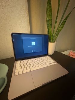 Pink NEO Laptop with Touch ID