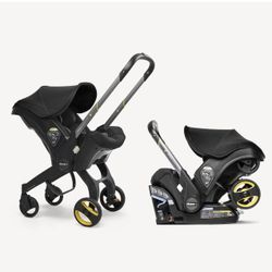 NITRO BLACK DOONA CARSEAT AND STROLLER 