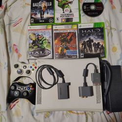 Xbox360 used, fully functional with 2 controllers and 6 games!