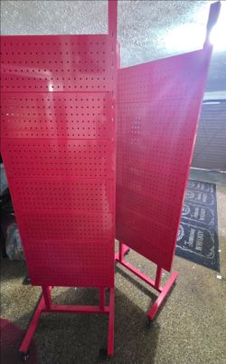 Red Metal Pegboard Display Stand on Wheels