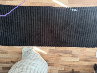 Two small black blankets