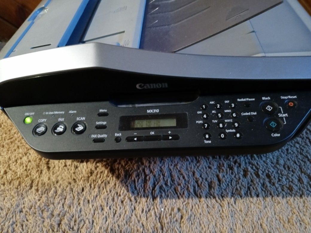 Cannon Mx310